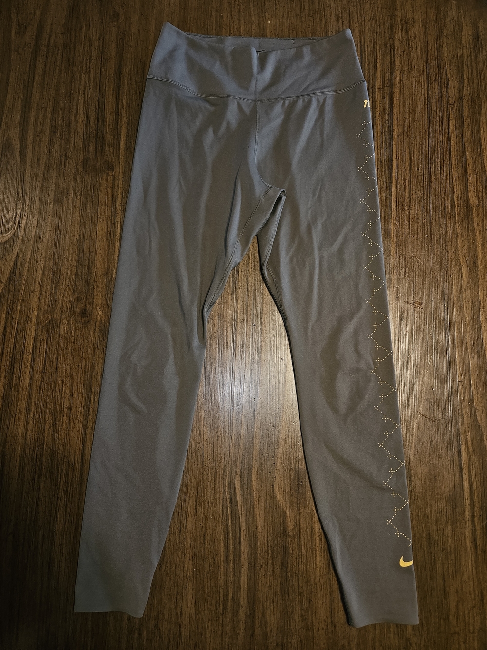 Nike Green Leggings with Gold Accent Swoosh